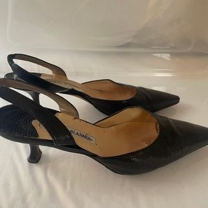 Strap low heels, black. Leather with a grain.